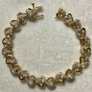 14 K Gold over Sterling Silver,Genuine Diamonds, Hearts Bracelet with Safety Clasp